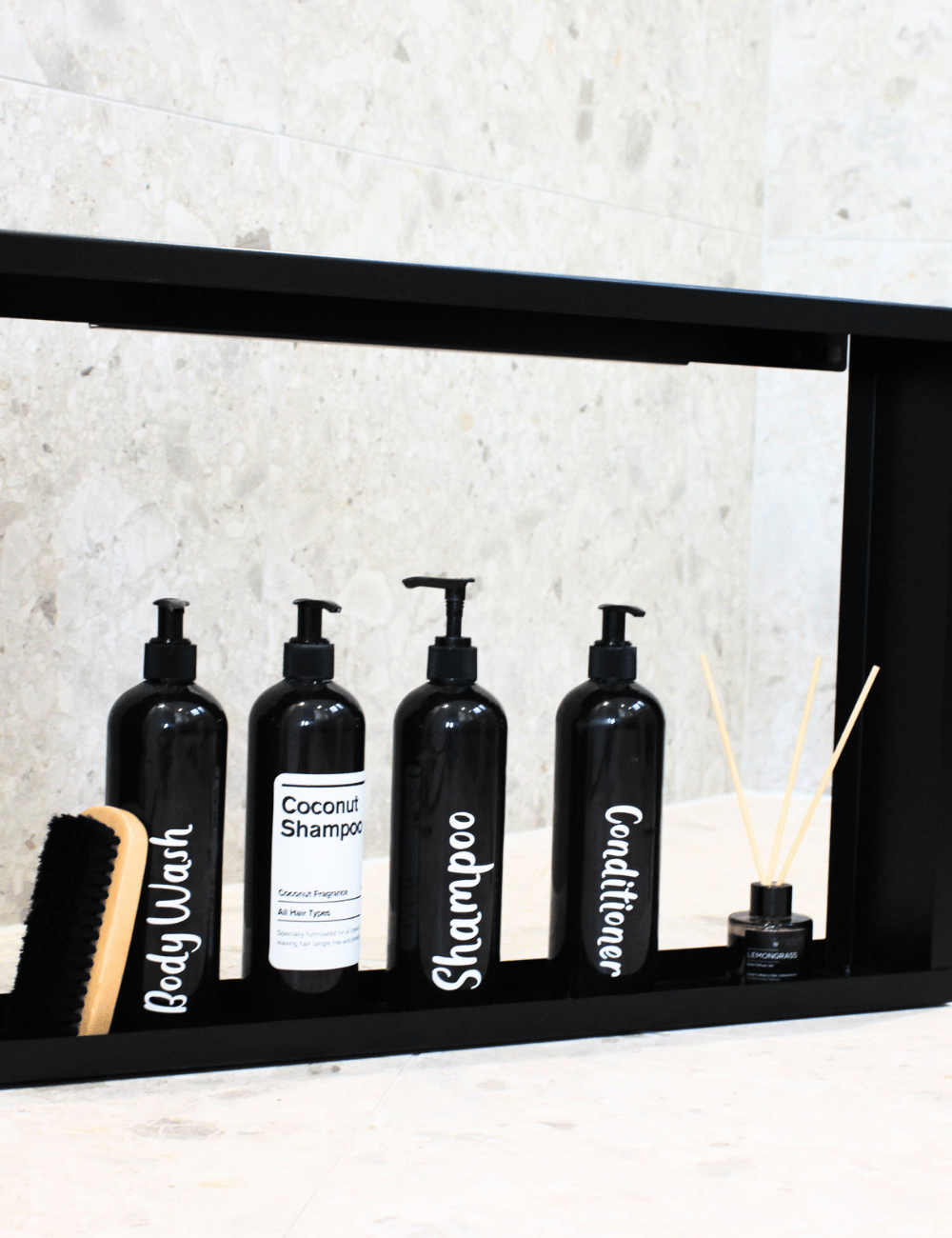 Shower caddy shelf with shampoo and conditioner bottles